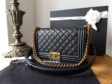 black chanel boy gold hardware|chanel bag.